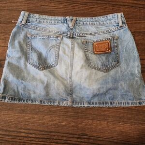 Dolce & Gabbana Light Blue Denim Mini Skirt with Branded Patch